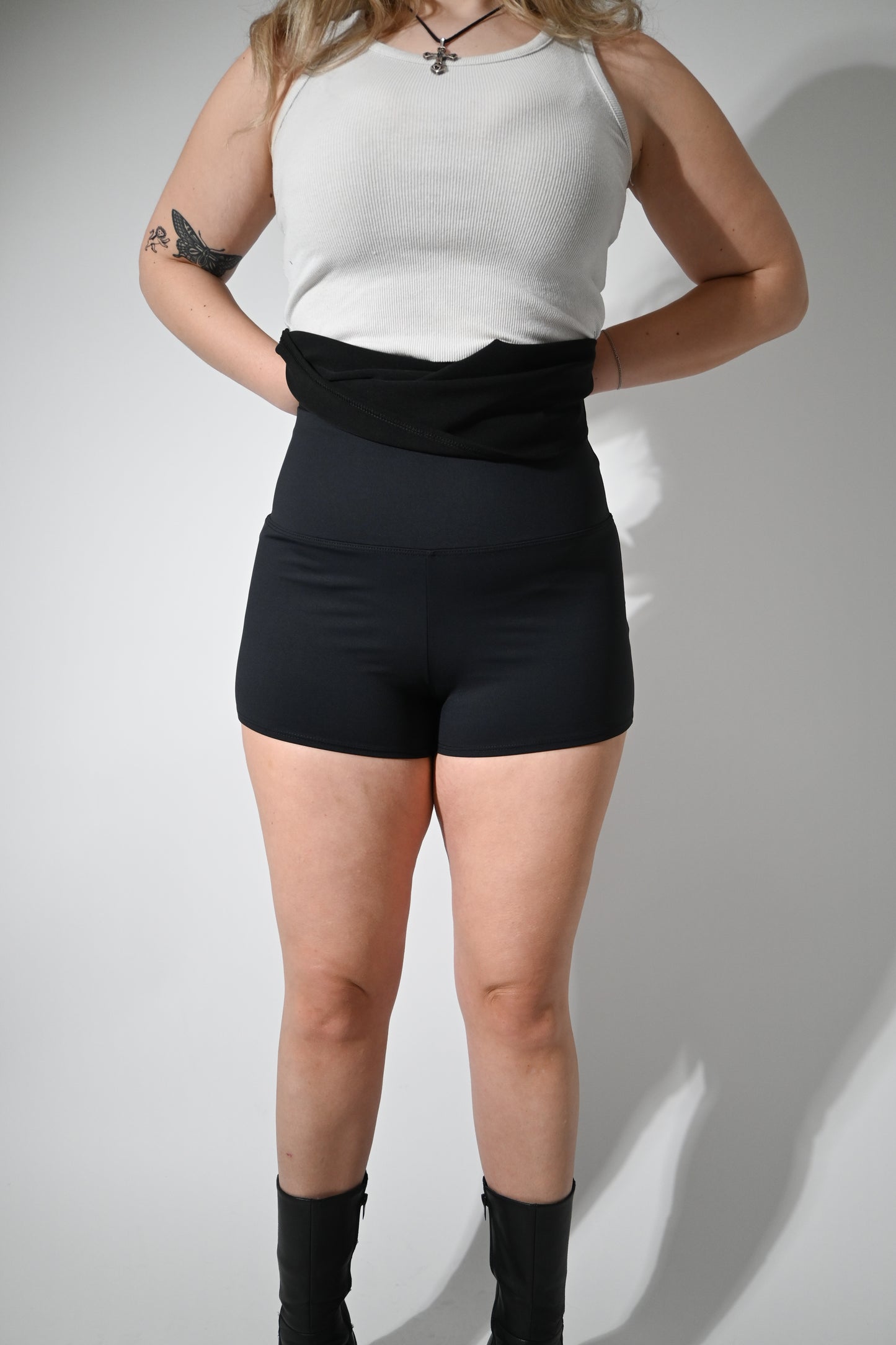 Kendall is 5'4" wearing a size M with a 14" length