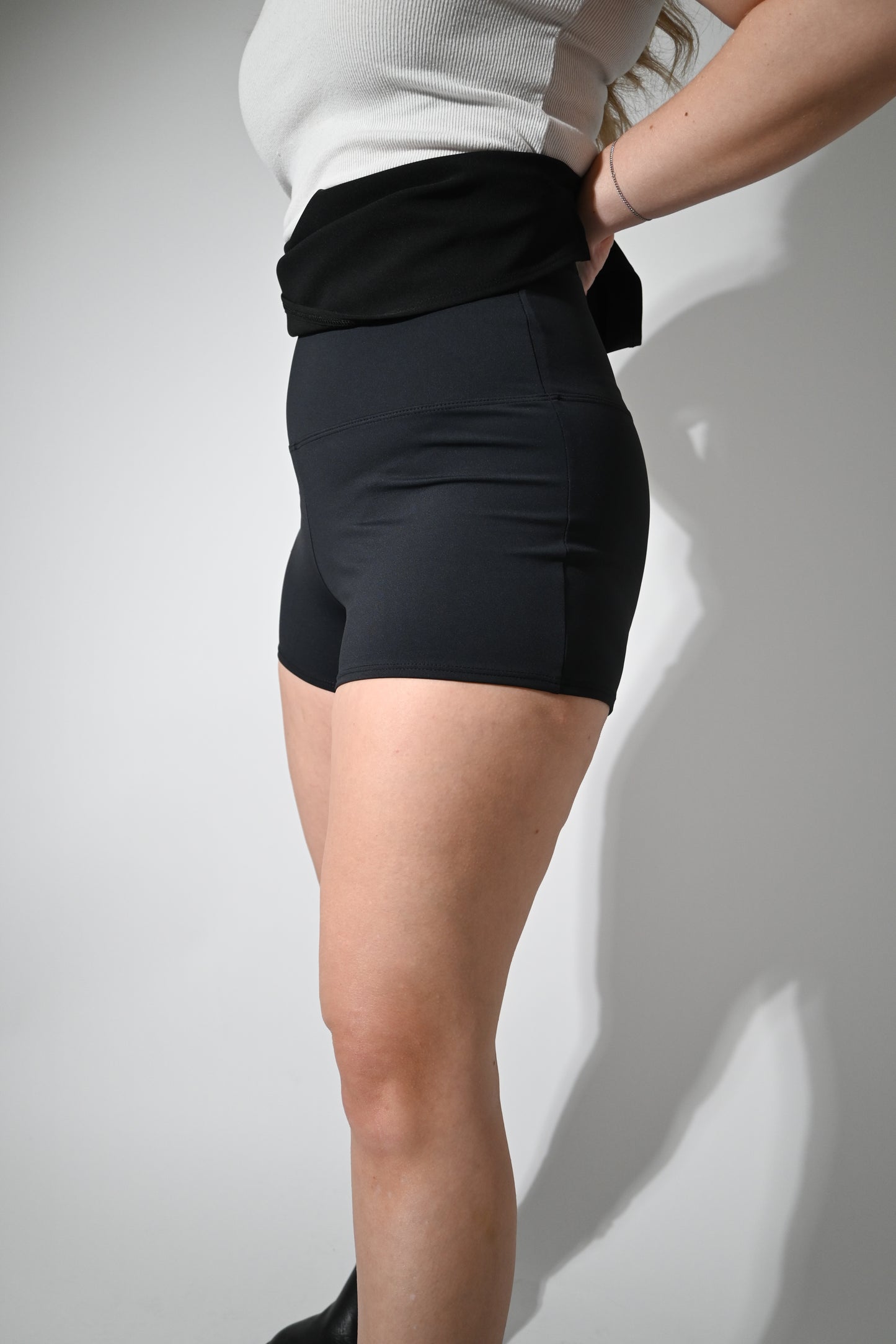 Kendall is 5'4" wearing a size M with a 14" length