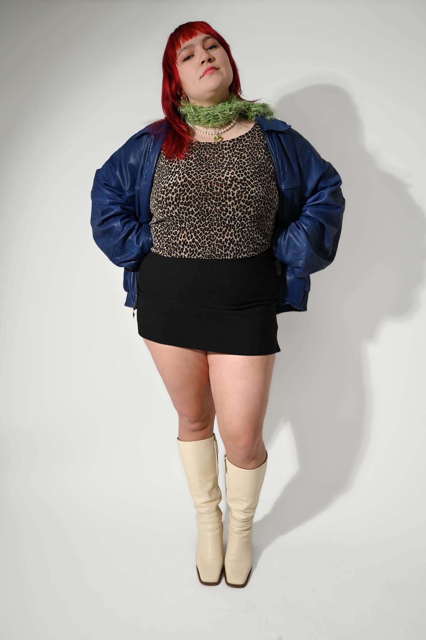 Storrey is 5'6" wearing a size 2XL with a 15" length